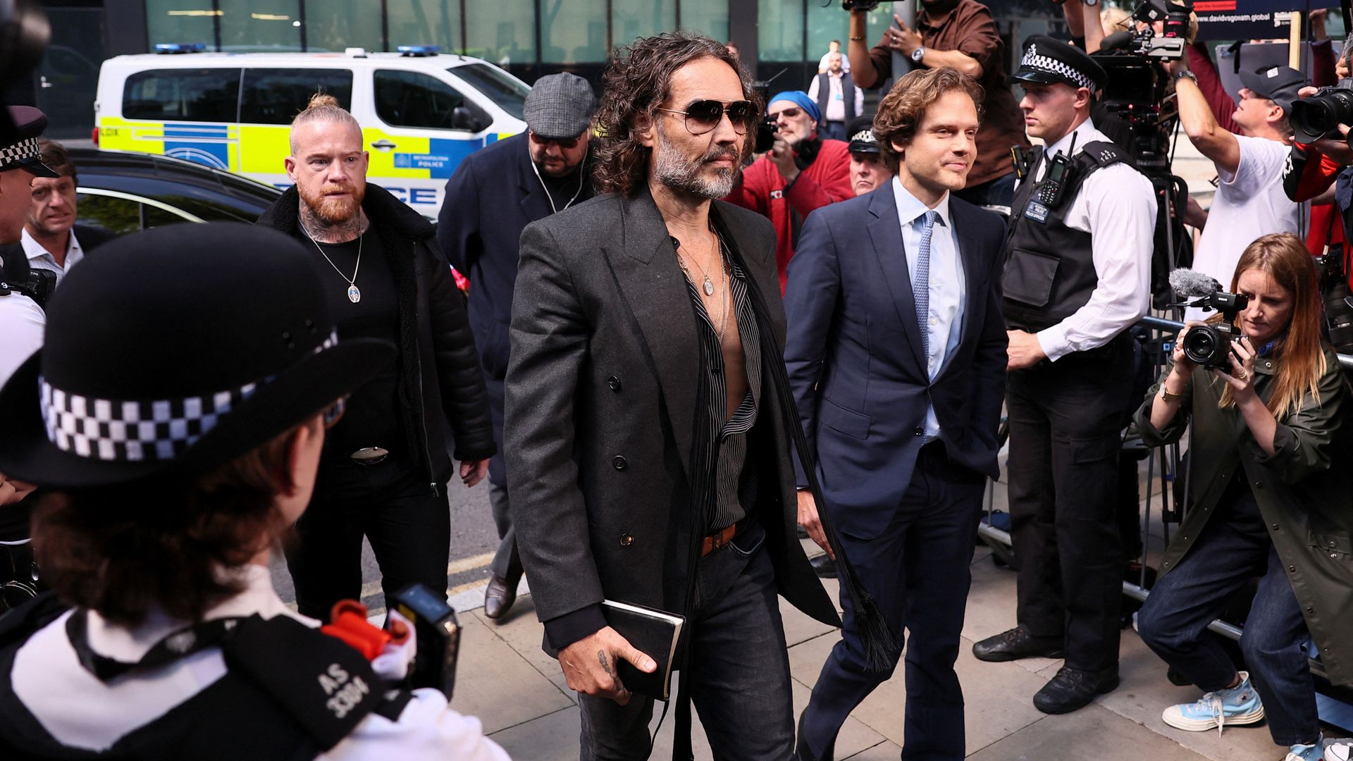 Comedian and actor Russell Brand pleads not guilty to rape and sexual assault charges