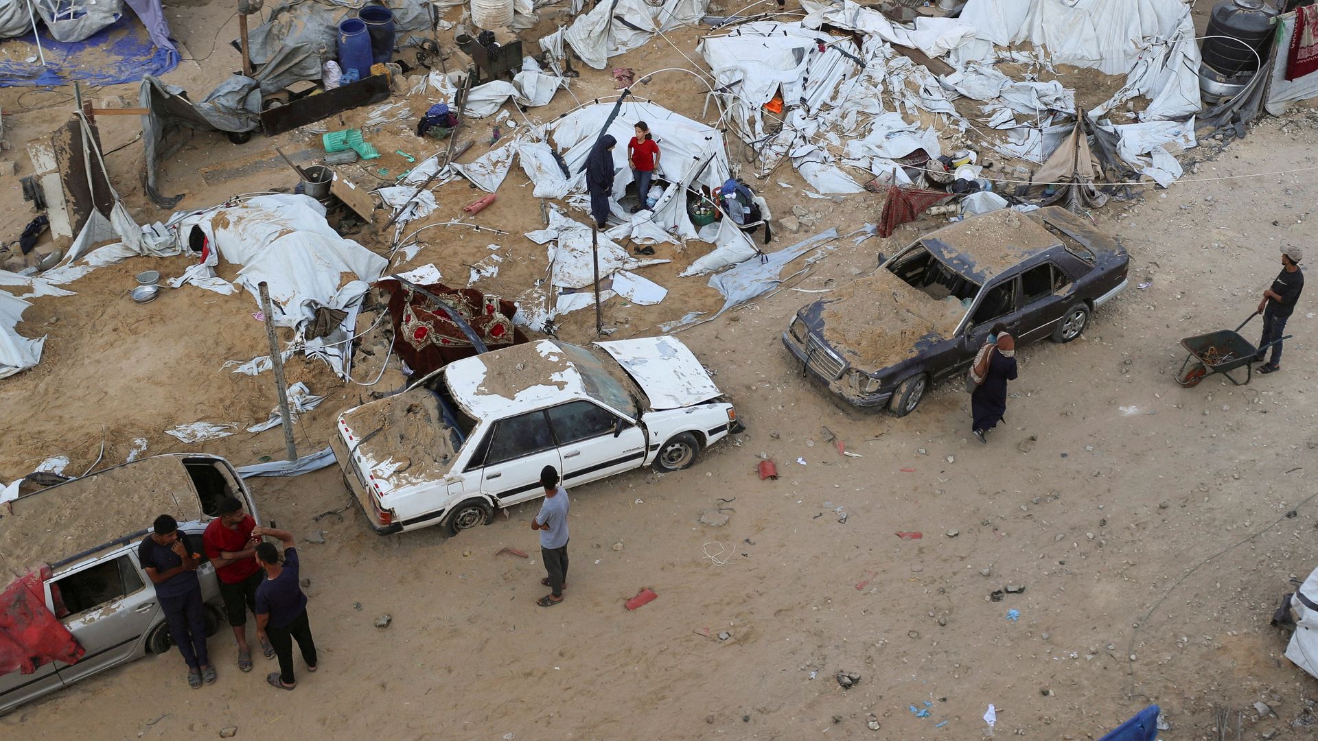 At least 60 killed in Israeli strikes across Gaza, health staff say – as Trump makes ceasefire prediction